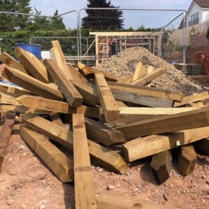 A pile of used pegging out sticks, they've been used on site for marking out digging areas - communiion architects herefiord