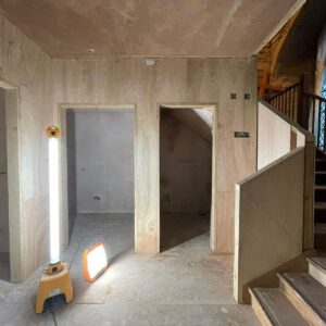 unadorned timber bording, creating the basic construction for a set of toilets. Part of a wider church reordering project by communion architects Hereford