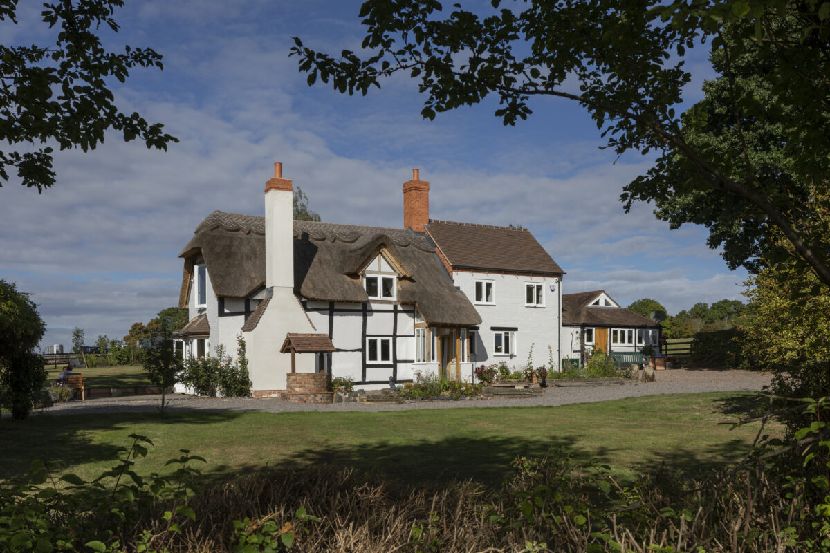 Listed thatch cottage, Worcestershire by Communion Architects