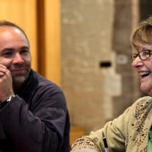 A man and a woman chatting