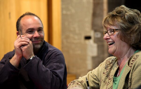 A man and a woman chatting