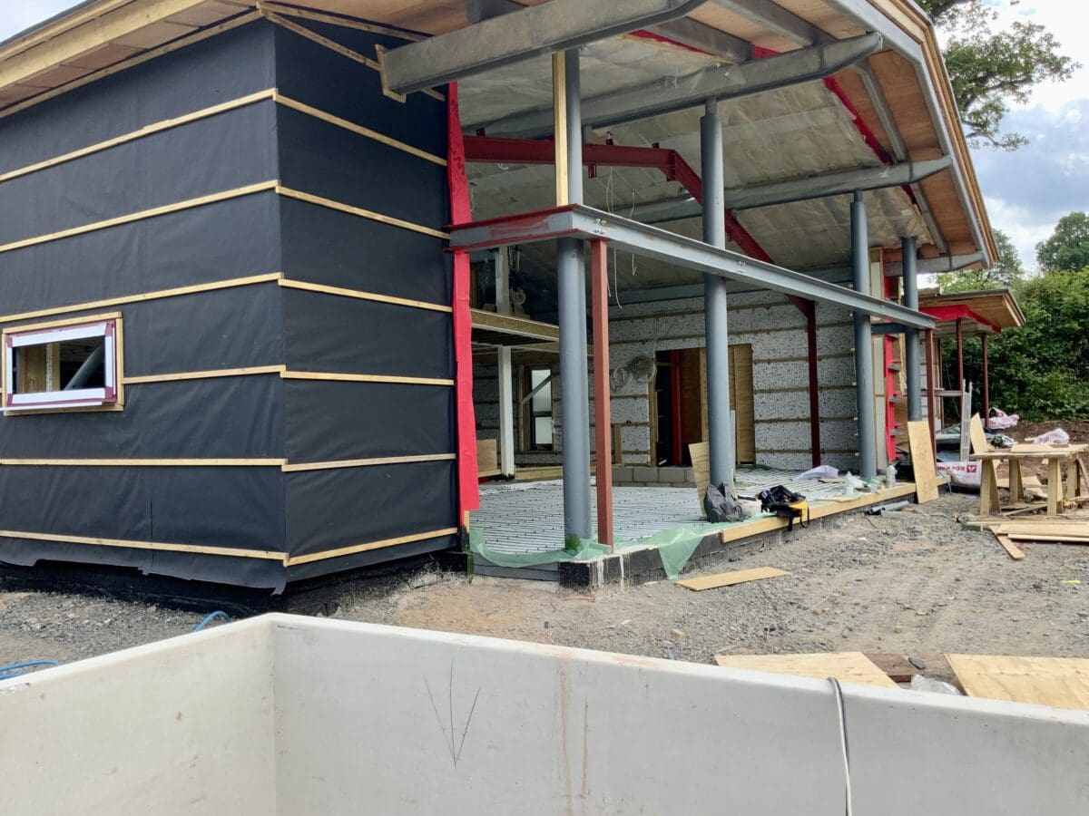 Close up of the soon-to- be-glazed west elevation of a stunning barn conversion with incredible views. Communion Architects Hereford