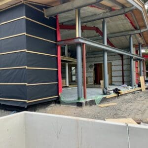 Close up of the soon-to- be-glazed west elevation of a stunning barn conversion with incredible views. Communion Architects Hereford